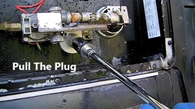 Pulling RV water heater drain plug